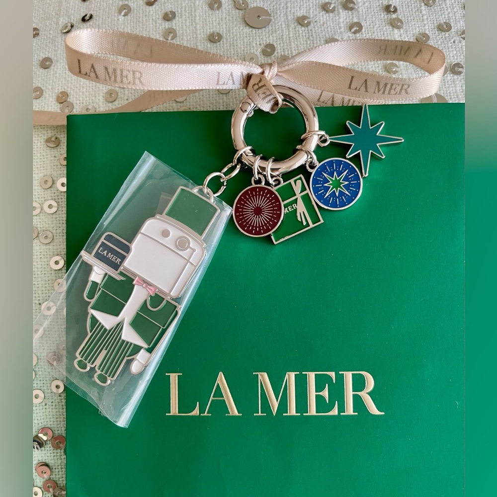 La Mer Skincare with Green, Red, and Blue Charms